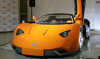 Николай Фоменко показал спорткар Marussia Николай Фоменко показал спорткар Marussia