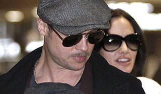 Джоли показала своих близнецов Джоли показала своих близнецов