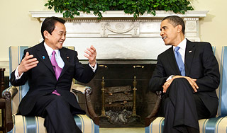 Обама встретил первого иностранного гостя Обама встретил первого иностранного гостя