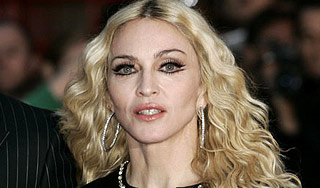 Папарацци свалили Мадонну с лошади Папарацци свалили Мадонну с лошади