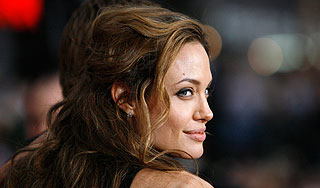 Бекхэм не хочет видеть Джоли в купальнике Бекхэм не хочет видеть Джоли в купальнике