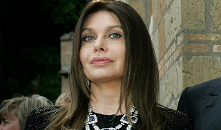 Жена Берлускони потребовала 43 млн евро Жена Берлускони потребовала 43 млн евро