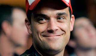 Робби Уильямс обручился в прямом эфире Робби Уильямс обручился в прямом эфире