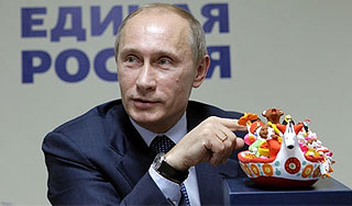 Путину подарили символ "Единой России" Путину подарили символ "Единой России"