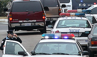 Юный грабитель взял заложников в банке Юный грабитель взял заложников в банке