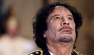 Блондинка-украинка хочет сбежать от Каддафи Блондинка-украинка хочет сбежать от Каддафи