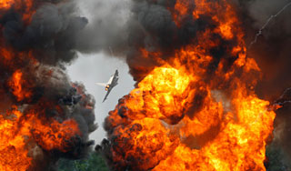 Самолеты ВВС Ливии бомбят повстанцев Самолеты ВВС Ливии бомбят повстанцев