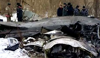 Обломки Ан-148 упали в болото и на кладбище Обломки Ан-148 упали в болото и на кладбище