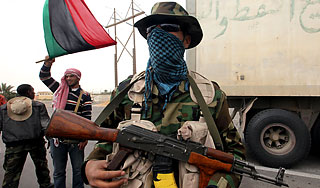 Обама просит вооружить повстанцев в Ливии Обама просит вооружить повстанцев в Ливии