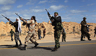 Каддафи назначил награду за главного врага Каддафи назначил награду за главного врага