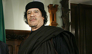 Каддафи предложил деньги России и Китаю Каддафи предложил деньги России и Китаю