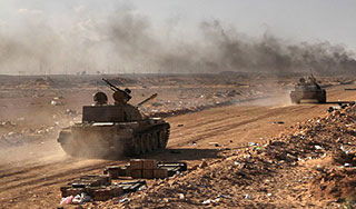 Каддафи начал решающий бой с повстанцами Каддафи начал решающий бой с повстанцами