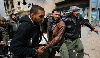 Оппозиция мечтает о деньгах Каддафи Оппозиция мечтает о деньгах Каддафи