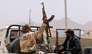 Каддафи торгуется с НАТО о мире Каддафи торгуется с НАТО о мире