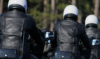 Сотрудникам ФСО выдадут кожаные плащи Сотрудникам ФСО выдадут кожаные плащи