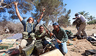 Франция отдаст деньги Каддафи его врагам Франция отдаст деньги Каддафи его врагам