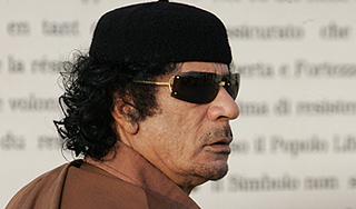 Интерпол выдаст Каддафи "красную карточку" Интерпол выдаст Каддафи "красную карточку"