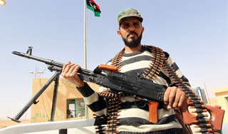 Каддафи призвал защитить Сирт от зверств Каддафи призвал защитить Сирт от зверств