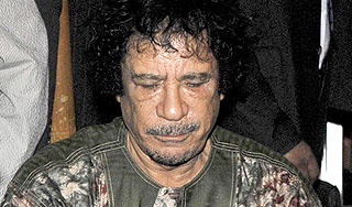 Каддафи умер от ран Каддафи умер от ран