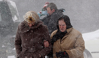 Оттаявшую Москву заметает снегом Оттаявшую Москву заметает снегом