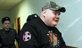 "Рыжий Тарзан" рвался из клетки в суде "Рыжий Тарзан" рвался из клетки в суде