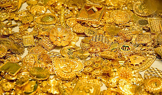 Родню Каддафи поймали с 10 кг золота Родню Каддафи поймали с 10 кг золота