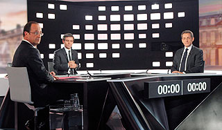 Саркози провел решающую дуэль с Олландом Саркози провел решающую дуэль с Олландом