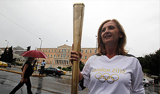 Британка продала олимпийский факел Британка продала олимпийский факел