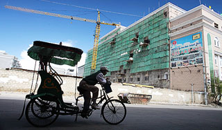 Китаец два года ехал на Игры на велорикше Китаец два года ехал на Игры на велорикше