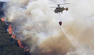 Лесные пожары охватывают Сибирь Лесные пожары охватывают Сибирь