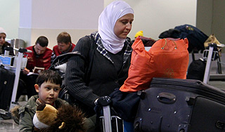 77 россиян вернулись из Сирии в Москву 77 россиян вернулись из Сирии в Москву