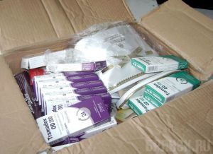 В посылке с тапочками обнаружили наркотические таблетки