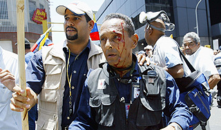 Венесуэла подозревает в бойне американца Венесуэла подозревает в бойне американца