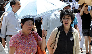 Жара доводит японцев до больницы Жара доводит японцев до больницы