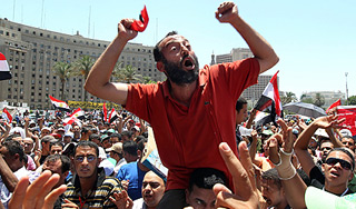 Сторонники Мурси вышли на марш в Каире Сторонники Мурси вышли на марш в Каире