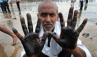 Нефтяное пятно достигло пляжей Таиланда Нефтяное пятно достигло пляжей Таиланда