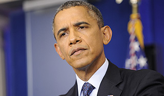 Обама грозит миру экономическим хаосом Обама грозит миру экономическим хаосом