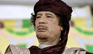 Вдова Каддафи требует выдать тело мужа Вдова Каддафи требует выдать тело мужа