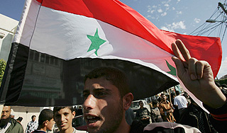 Лидер сирийской оппозиции ударил оппонента Лидер сирийской оппозиции ударил оппонента