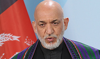 Карзай осудил авиаудар США по афганцам Карзай осудил авиаудар США по афганцам