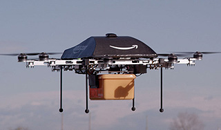 Посылки Amazon доставят беспилотники Посылки Amazon доставят беспилотники
