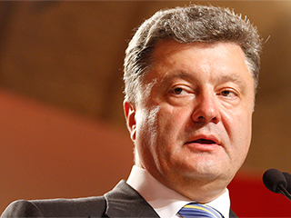 Порошенко узрел поддержку Путина Порошенко узрел поддержку Путина