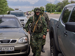Силовики обстреляли рынок в Луганске Силовики обстреляли рынок в Луганске