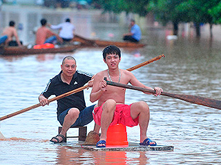 Тайфун лишил крова 150 тысяч жителей Китая Тайфун лишил крова 150 тысяч жителей Китая