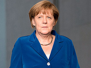 Рига встретила Меркель протестом Рига встретила Меркель протестом