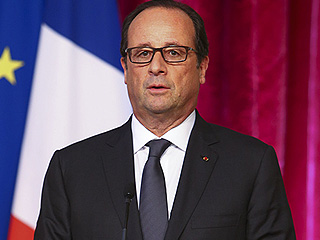 Французы высмеяли низкорослого Олланда Французы высмеяли низкорослого Олланда