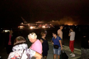 Испуганные россияне молились на борту Boeing Испуганные россияне молились на борту Boeing