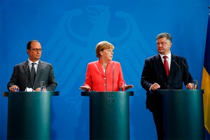 Олланд и Меркель хотят утихомирить Порошенко Олланд и Меркель хотят утихомирить Порошенко